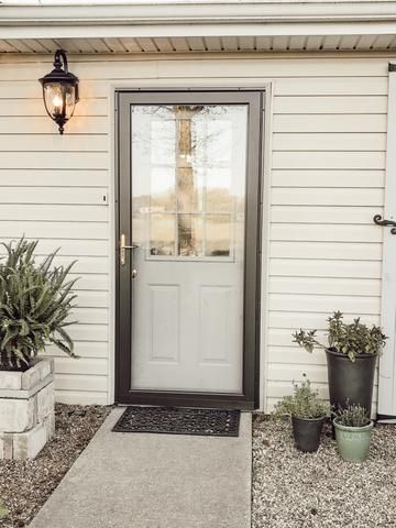 Door With Storm Door, Storm Door Makeover, White Storm Door, Larson Storm Doors, Door Update, Steel Pergola, Cape Cod House, Grey Houses, Italian Home