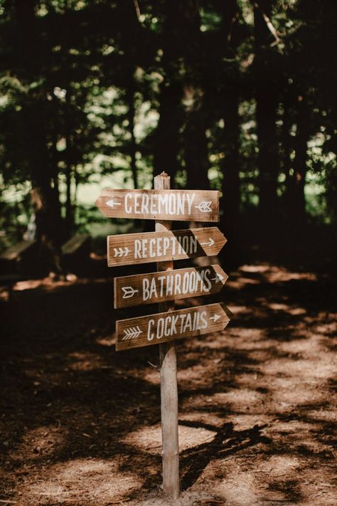 This Cozy Camp Walden Wedding Showed Off the Couple's Creative Side | Junebug Weddings Campground Wedding Decorations, Camping Inspired Wedding, Camp Inspired Wedding, Outdoor Wedding Signage, Camp Wedding Decor, Camp Signage, Cairns Wedding, Lake Side Wedding, Campsite Wedding