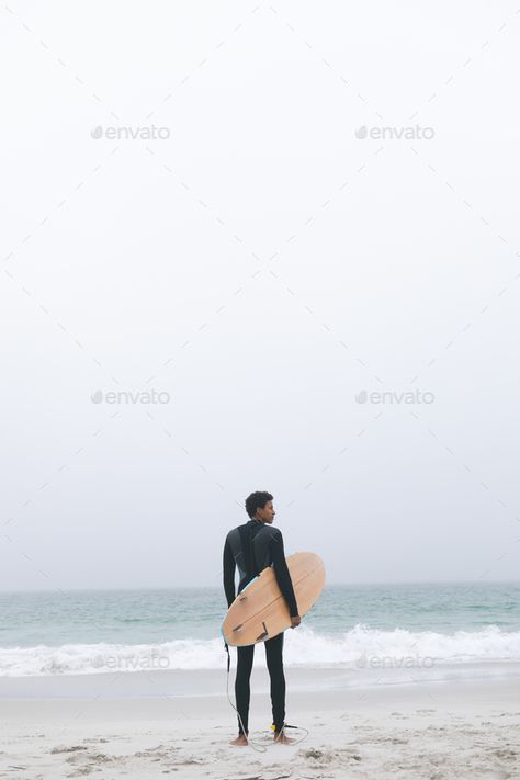 Thoughtful young mixed-race male surfer holding surfboard on the beach. by Wavebreakmedia. Rear view of thoughtful young mixed-race male surfer holding surfboard on the beach. He is looking away #AD #race, #male, #surfer, #Thoughtful Male Surfer, Vector Illustrations, Rear View, Surfboard, The Beach, Vector Illustration, Illustrations