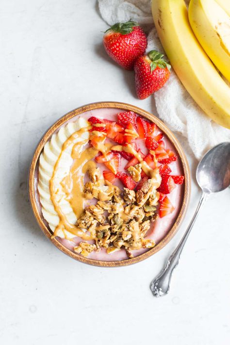 This easy Strawberry Banana Smoothie Bowl is a simple and sweet treat! It's a healthy Paleo + vegan breakfast or snack made with only a few ingredients, and you can add whichever toppings your heart desires to customize to your tastes. Aesthetic Smoothie Bowl, Aesthetic Smoothie, Homemade Fruit Snacks, Strawberry Oatmeal Bars, Acai Bowls Recipe, Banana Smoothie Bowl, Healthy Vegan Breakfast, Fruit Toppings, Strawberry Banana Smoothie