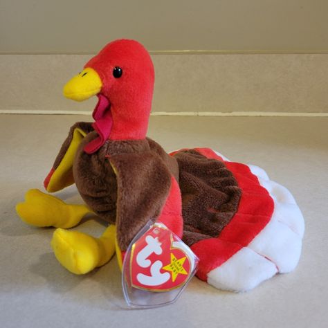 Mint Condition With Tag Protector Gobbles The Turkey Rare Early 1st Edition Style #4034 "Top 16 Most Valuable Beanie Babies In 2021. Gobbles, A Turkey, Was The Most Expensive Sale Of The Year. This Particular One Featured Multiple Errors, Including Spacing On The Tag, A Stamp On The Tag And A Circle 'R' Symbol In A Different Position Than Usual. Gobbles Was Released In 1997 And Retired In 1999." Errors: Birthrate 11-27-96 Not November 27, 1996 Oakbrook On Hang & Tush Tags Should Be 2 Words No Co Most Expensive Beanie Babies, Valuable Beanie Babies, Rare Beanie Babies, Ty Plush, Fur Real Friends, Purple Candy, Baby Beanies, Ty Beanie Boos, Pokemon Plush