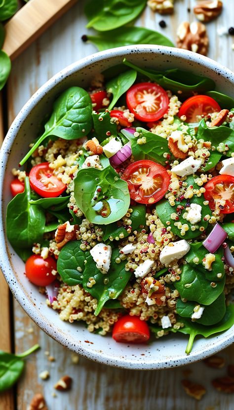 Recipe: Quinoa & Spinach Salad

Ingredients:
- 1 cup quinoa
- 2 cups water
- 2 cups fresh spinach
- 1/2 cup cherry tomatoes, halved
- 1/4 cup red onion, thinly sliced
- 1/4 cup crumbled feta cheese
- 1/4 cup walnuts, chopped
- 2 tbsp olive oil
- 1 tbsp lemon juice
- Salt and pepper to taste

Instructions:
1. Rinse quinoa; cook with water in a saucepan until water is absorbed (approx. 15 mins). Let it cool.
2. In a bowl, combine cooled quinoa, spinach, tomatoes, onion, feta, and walnuts.
3. In a small bowl, whisk olive oil, lemon juice, salt, and pepper.
4. Drizzle the dressing over the salad and toss gently.
5. Serve immediately or chill for 30 mins.

Benefits: High in protein and fiber, this salad supports digestive health, provides essential nutrients, and boosts energy. Quinoa Spinach Salad Recipes, Quinoa Spinach Salad, Recipe Quinoa, Easy Quinoa, Quinoa Spinach, Fresh Spinach, Recipe Healthy, Spinach Salad, Quinoa Recipes