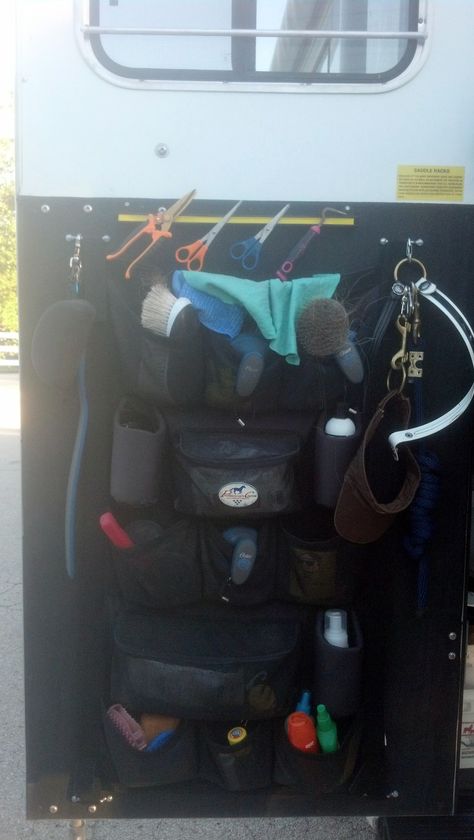 We just added a Magnetic Tool Holder Bar (Yellow) to keep metal items like our hook pick handy on the Trailer Door.  Of course, the organizer is a must.  Notice too  we hung items from the footman's loops (holding up the organizer) using Rings & S-Binder Clips. Horse Trailer Door Organizer, Bumper Pull Horse Trailer Organization, Horse Organization, Cowboy Camping, Horse Trailer Organization, Trailer Hacks, Tack Room Organization, Horse Camping, Horse Float