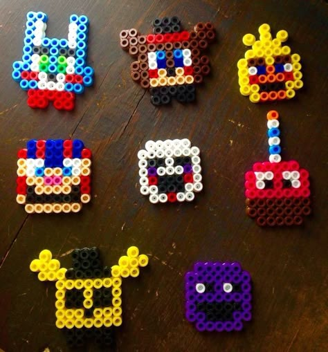 Toy Bonnie Perler Beads, Purple Guy Perler Beads, Perler Bead Patterns Music, Fnaf Pearl Beads, Fnaf Beads Pattern, Perler Bead Patterns Fnaf, Fnaf Crafts Diy, Fnaf Diy Crafts, Fnaf Perler Beads Pattern