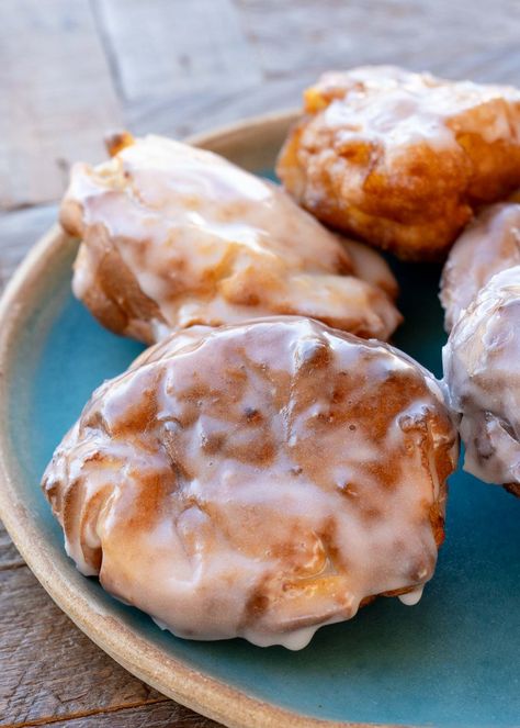 These delicious Air Fryer Apple Fritters are the perfect sweet snack! Packed full of tart apples and covered in an easy glaze, this dessert recipe will be your favorite way to warm up this fall. Apple Waffle Recipe, Air Fryer Apple Fritters, Donuts Filled, Homemade Apple Fritters, Apple Fritters Recipe, Gluten Free Bisquick, Breakfast Sides Dishes, Cinnamon Glaze, Fried Donuts