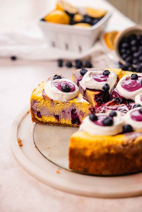 Lemon Blueberry Cheesecake - Flouring Kitchen Greek Yogurt Whipped Cream, Raspberry Tiramisu, Creamy Cheesecake Recipe, Whipped Yogurt, Lemon Blueberry Cheesecake, Fudgy Brownie, Lemon Cheesecake, Soften Cream Cheese, Baked Goodies