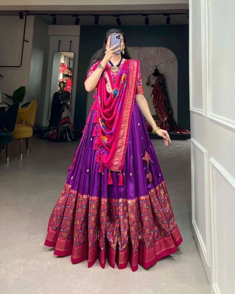 Rate : 1500 #apex__outfit Drape yourself in the elegance of Tussar Silk Lehenga, where print tells a story of timeless beauty and sophistication🌷 Lehenga(Stitched) : Lehenga Fabric : Tussar Silk Lehenga Work : Print With Foil Work Lehenga Waist : SUPPORTED UP TO 42 Lehenga Closer : Drawstring With Heavy Tassels and Zip Stitching : Stitched With Canvas and attached with Can Can Length : 42 Flair : 3.80 Meter Inner : Micro Cotton Blouse(Unstitched) : Blouse fabric : Tussar Silk Blouse Work... Tassels Design For Lehenga, Pink Purple Lehenga, Dress Illustration Design, Purple Lehenga, Lehenga Crop Top, Choli Dress, Purple Foil, Lehenga Choli Wedding, Indian Wedding Outfit