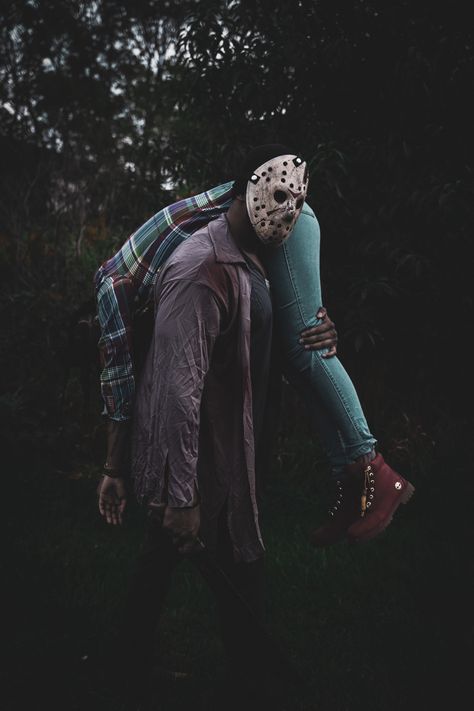 Jason Vorhees carries a lady across his back while walking Jason Halloween Photoshoot, Friday The 13 Photoshoot, 80s Slasher Photoshoot, Friday The 13th Photoshoot, Jason Voorhees Photoshoot, Jason Friday The 13th Costume, Halloween Pictures Couples, Halloween Couple Poses, County Relationship