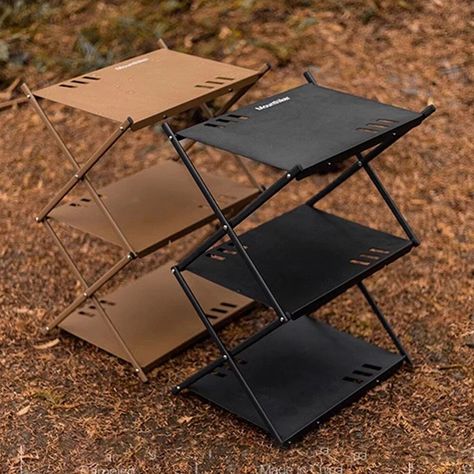 Discover the Ultimate Outdoor Companion Transform your outdoor adventures with our Multi-Level Portable Folding Camping Shelf. Designed for the modern explorer, this table embodies the perfect blend of style and functionality. Whether you're camping, tailgating, or enjoying a backyard barbecue, this table is your go-to accessory for every outdoor occasion. Exceptional Features Sturdy and Lightweight Aluminum Construction Three Spacious Layers for Ample Storage Effortless Folding Design for Easy Portability Elegant Korean Style that Complements Any Setting Multi-functional Use – Ideal for Outdoor and Camping Activities Why Choose Our Folding Camping Shelf? Our Folding Camping Shelf stands out with its unique blend of style, durability, and versatility. The Korean style design adds an elegan Outdoor Bbq Table, Glamping Accessories, Folding Camping Table, Chuck Box, Bbq Table, Camping Set Up, Camping Storage, Camping Tools, Camping Furniture