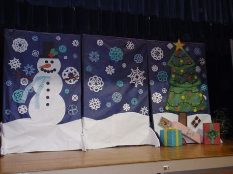 Winter program backdrop; I'd need to shorten these and hang from ceiling to fit in our cafeteria and not block performers Christmas Program Backdrop Ideas, Christmas Program Background, Christmas Play Backdrop, Christmas Program Decorations, Winter Backdrop Ideas, Concert Decorations, Cardboard Snowman, Concert Decor, Christmas Concert Ideas