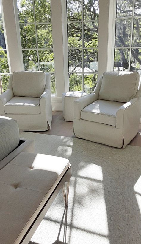 Swivel glider chairs in a master bedroom nook with floor-to-ceiling windows are a great way to add seating.  These comfortable swivel gliders make it easy to face the room or to turn around to look out the window.  Let us know what custom-upholstered furniture needs we can help you with today! Bay Window Seating, Cape Cod Exterior, Kiawah Island South Carolina, Window Seating, Coastal Living Decor, Bay Window Seat, Bedroom Nook, Swivel Glider Chair, Bedroom Accent