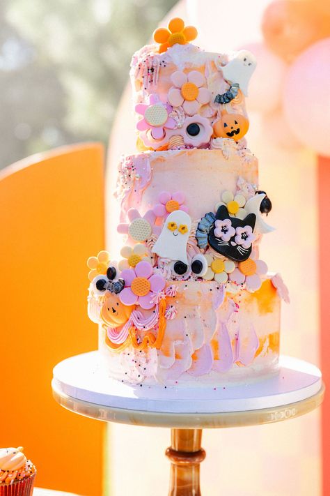 A Groovy & Spooky Halloween • Beijos Events Two Spooky Cake, Pink And Orange Halloween Cake, Groovy Halloween Birthday Party, Groovy Halloween Cake, Groovy Halloween Party, Groovy Halloween, Halloween Smash Cake, Halloween Centers, Ghost Cake