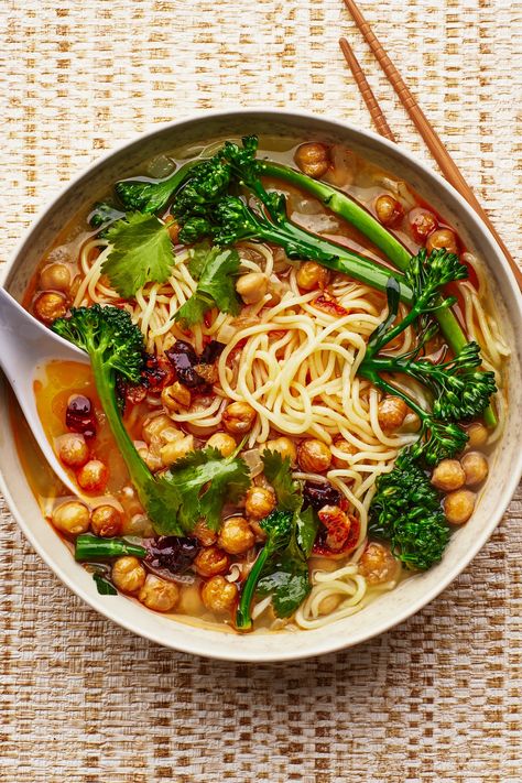 This is a super-flavorful vegetarian soup that comes together in just about 30 minutes. It's cozy, warming, and very comforting and it's perfect for a weeknight meal that can be eaten by both vegans and vegetarians. Braised Lentils, Chile Crisp, Chickpea Noodle Soup, Chickpea Noodle, Vegan Pasta Sauce, Creamy Vegan Pasta, How To Cook Greens, Wheat Noodles, Comforting Soup