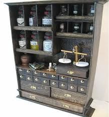 Apothecary Cabinet Dollhouse Medical, Miniature Medical, Haunted Dollhouse, Apothecary Cabinet, Room Boxes, Halloween Miniatures, Cabinet Of Curiosities, Hero's Journey, Miniature Kitchen