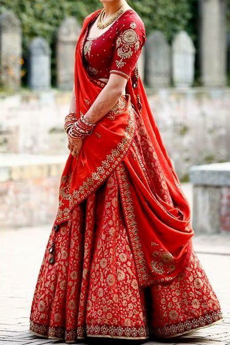 Trending dupatta draping styles | Single dupatta draping idea | Red banarasi silk lehenga | Red and orange lehenga | Traditional Indian Bridal look | Bridal fashion | Every Indian bride’s Fav. Wedding E-magazine to read. Here for any marriage advice you need | www.wittyvows.com shares things no one tells brides, covers real weddings, ideas, inspirations, design trends and the right vendors, candid photographers etc. Latest Bridal Lehenga, Bridal Dupatta, Wedding Lehenga Designs, Indian Bride Outfits, Lehnga Dress, Bridal Lehenga Collection, Designer Bridal Lehenga, Indian Bridal Lehenga, Bridal Lehenga Red