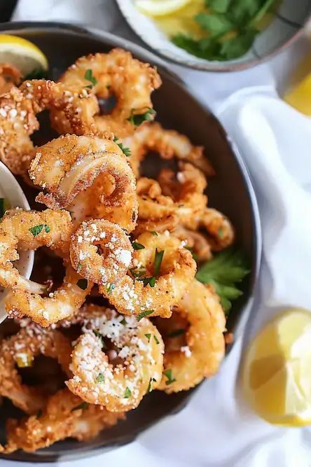 Delicious fried calamari served with homemade tzatziki sauce. Calamari Dipping Sauce, Dipping Sauce Recipes, Szechuan Beef, Grilled Calamari, Homemade Tzatziki Sauce, Roasted Pepper Sauce, Grilled Portobello, Homemade Tzatziki, Fried Calamari