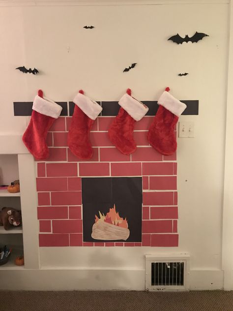 Paper Stocking Decorating Ideas, Bulletin Board Fireplace, Construction Paper Fireplace, Diy Fireplace For Classroom, Christmas Fireplace Classroom Door Ideas, Construction Paper Fireplace Christmas, Paper Fireplace, Christmas Diy Fireplace Cardboard, Christmas Stall Ideas