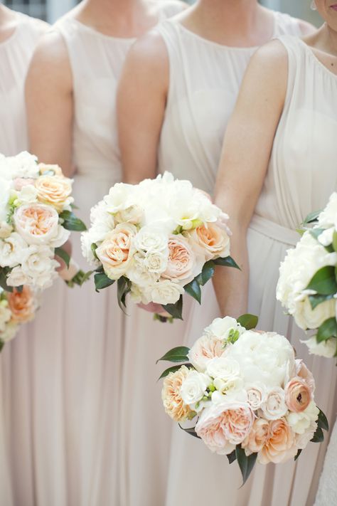 With Georgia and Virginia as their home states, this couple wanted nothing more than to infuse their Southern roots into their wedding day, and elegantly so they did. Branching Out crafted beautiful peach and magnolia foliage centerpieces, while bridesmaids wore full-length champagne Jenny White Bridesmaid Flowers, Peach And White Bouquet, Wedding Flowers Neutral, Flowers Neutral, Jenny Yoo Bridesmaid, Neutral Bridesmaid Dresses, White Bridesmaid, Bridesmaid Inspiration, Designer Bridesmaid Dresses