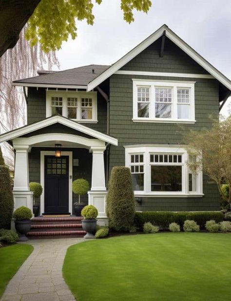 22 Dark Olive Green House Exterior Ideas for Curb Appeal Revamp Siding Colors For Houses With Stone, Dark Green House Exterior White Windows, Green Vinyl Siding House Exterior Colors Black Shutters, House With Green Exterior, Beige House With Green Trim, Craftsman Home Colors Exterior, Green Outdoor House Paint, Green Sided House, Classic Cottage Exterior