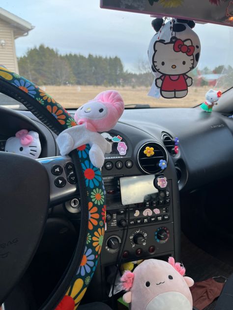 sanrio hello kitty indie flower squish squishmallow squishmallows car vehicle aesthetic cute decor decoration Decorating Bfs Car, Squishmallow Car Decor, Hello Kitty Car Interior, Inside Of Car Aesthetic, Inside Car Ideas, Kawaii Aesthetic Car, Car Squishmallow, Indie Car Decor, Indie Car Aesthetic