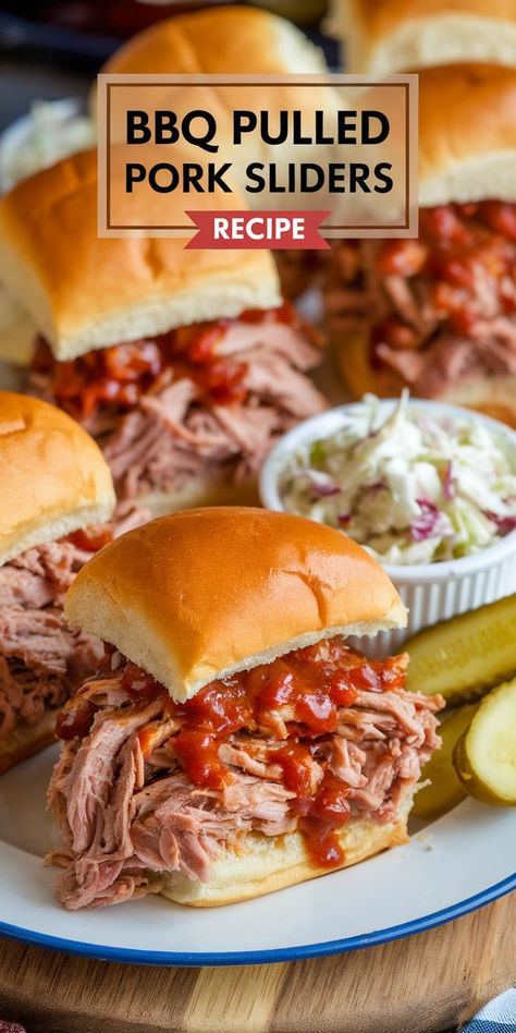 These BBQ Pulled Pork Sliders are sweet, smoky, and absolutely irresistible! Slow-cooked pulled pork piled onto soft buns and topped with tangy slaw—perfect for parties or game day. Barbecue Pork Sliders, Bbq Sliders Recipes Hawaiian Rolls, Barbeque Sliders, Slaw For Pulled Pork, Bbq Pulled Pork Sliders, Pork Sliders Recipes, Tangy Slaw, Bbq Sliders, Slow Cooked Pulled Pork