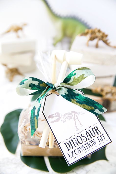 Dinosaur Dig Excavation Kits - A Pumpkin And A Princess Dinosaur Themed Birthday Party Centerpiece, Dinosaur Excavation Kit Diy, Dino Excavation Kit Diy, Boho Three Rex Party, Diy Dinosaur Party Favors, Dinosaur Favors Ideas, Dinosaur Toddler Birthday Party, Boho Dinosaur Party, Dinosaur Excavation Kit