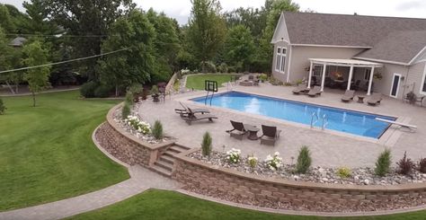 Pool Patio With Retaining Wall, Inground Pools With Retaining Walls, Pool Retaining Wall Ideas Sloped Yard, Pool Landscaping Retaining Wall, Inground Pool Retaining Wall Ideas, Backyard Pool With Retaining Wall, Retaining Wall For Pool, Retaining Wall Around Pool Ideas, Pool Landscaping With Retaining Wall