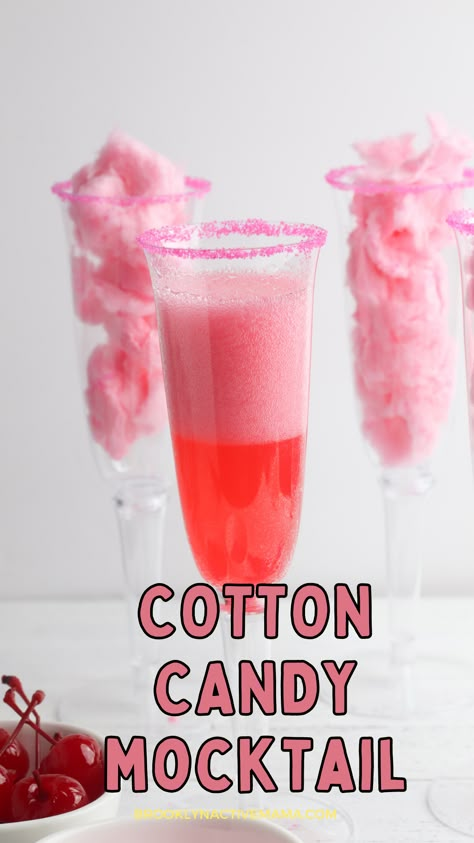 This fun and sweet non alcoholic tasty cotton candy mocktail has a very beautiful and festive pink color! This is a super fun drink to make for kids or non drinkers at a party! The recipe calls for cotton candy, pink sugar and strawberry soda which makes for a pretty sparking pink drink. This is a great sparkling drink recipe for a crowd! Your guests will be so impressed! #mocktail #nonalcoholicdrinks #nonalcoholic #mocktailrecipe Cotton Candy Non Alcoholic Drink, Pastel Drinks Aesthetic, Pink Drink For Kids Party, Gummy Bear Mocktails, Barbie Drinks For Kids, Pink Mocktails Non Alcoholic, Cotton Candy Mocktail, Pink Party Drinks, Cotton Candy Drinks