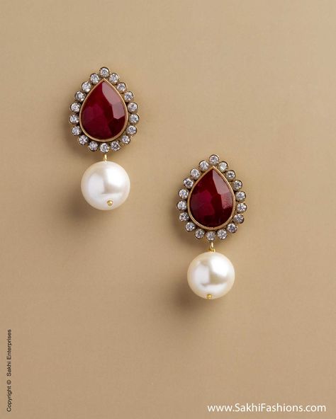 Perfect earring for the season..so  versatile blends with Indian and Western outfits..  AD-0013 Rubylite earring  Click-http://www.sakhifashions.com/ad-0013-rubylite-earring.html Pearl Jewellry, Pearl Earrings Designs, Pinterest Wardrobe, Gold Jhumka Earrings, Earrings Pretty, Large Silver Hoop Earrings, October Birthstone Jewelry, Diamond Earrings Design, Pearl Fashion