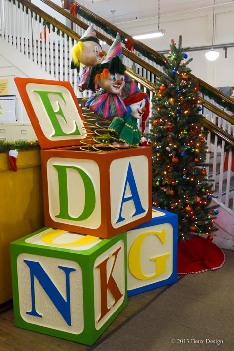 Giant Jack-in-the-Box with clown-like faces on big, moving springs! Sims Furniture Holiday Display, Covington, KY, location. Designed by Dana Burton and Dennis Dix, Deux Design. Christmas Toy Factory Decoration, Toy Factory Christmas Decoration, Santas Workshop Theme Decorations Diy, Toy Factory Christmas, Oversized Toys, Christmas Toy Factory, Christmas Toyland, Christmas Parade Floats, Sims Furniture