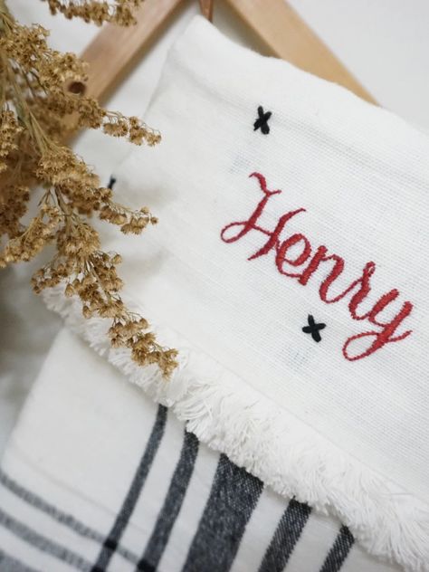 If you're like me and the millions of other twenty-something women out there, you've already bought a few "must-haves" from the Hearth & Hand collection at Target. This tutorial will teach you how to hand-embroider a name on the Christmas stockings! How To Embroider Name On Christmas Stocking, Christmas Stocking Name Ideas, Diy Personalized Stockings Christmas, Names On Stockings Diy, Christmas Stockings Ideas Homemade, How To Embroider Letters, Hand Collection, Embroidered Stockings, Stockings With Names