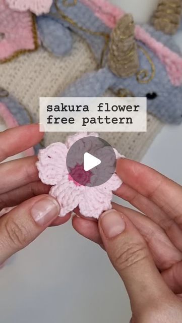 Cassia Mano on Instagram: "🌸SAKURA FREE PATTERN🌸
Mini florzinha de cerejeira bem fofa para decorar o que vc quiser!

#tutorial #flower #crochet #Sakura #handmade #receitagratuita

Sakura
1. 10sc in the MR (10)
2. 10inc (20)
3. [°slst, ch3, tr°, °tr, ch2, skip 1st, slst, tr, ch2, skip 1st, slst°, °2tr°, °tr, ch3, slst°] x5 this are the petals." Sakura Crochet, Sakura Flower, Flower Crochet, Free Pattern, Crochet, Flowers, 10 Things, Pattern, On Instagram