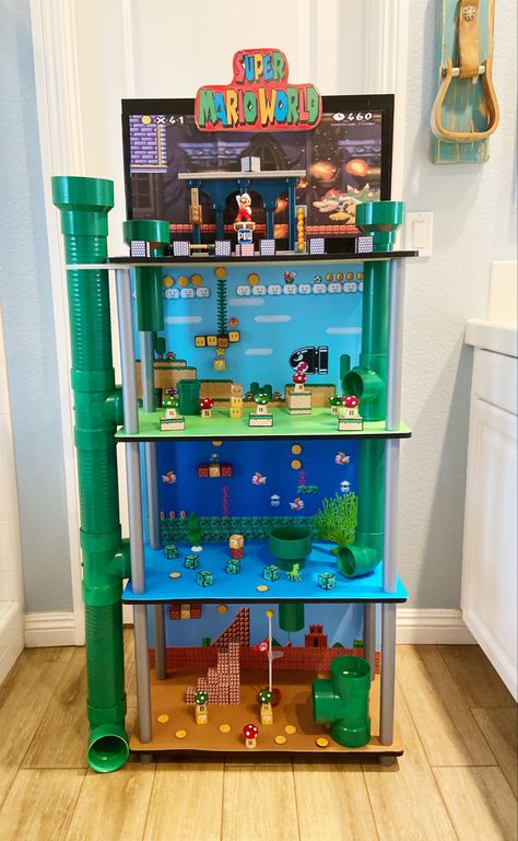 Super Mario Shelf, Mario Shelf Diy, Super Mario Dollar Tree, Mario Bros Doll House, Kids Mario Bedroom, Mario Room Decor Diy, Mario Kart Room Decor, Super Mario Room Diy, Super Mario Doll House Diy