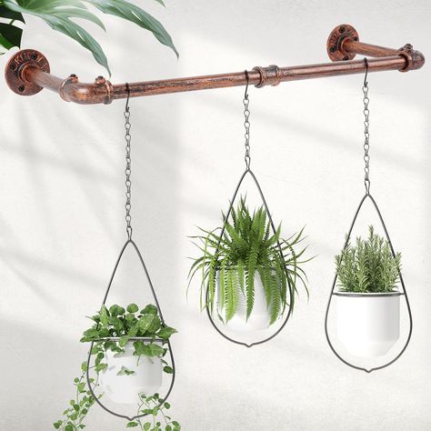 PRICES MAY VARY. Industrial and Vintage Design: This window plant hanger indoor consist of plant hanging rod + 3 plant hanging chains and 3 S hooks, which is made of qualified cast iron and industrial aluminum elbow pipes, applying traditional smelt technology to this plant hanger metal bar and coating a lay of bronze paint will be easily matched with your home décor style. Plant Hanger Bar with 3 Metal Chains and 3 S Hooks: we customized the black window plant hanger rod, the size is 36.2”x7” ( Plant Hanging Rod, Industrial Planter, Indoor Plant Hangers, Wall Plant Hanger, Cast Iron Plant, Plant Hanging, Window Plants, Hanging Planters Indoor, Hanging Plant Holder