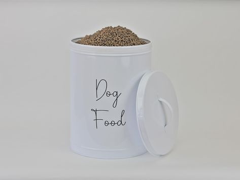 PRICES MAY VARY. Large- 20" tall, 15" diameter. Holds up to 40lbs of food. Features a silicone-lined lid that will keep your pets' kibble fresh and dry! Canister style holder will look good in your home but also keep your dog's food accessible. A comfortable handle and ergonomic design serve as the perfect counter decor and storage space! This container has a minimalist design and is a decorative and functional piece that will look fantastic in your kitchen, entryway, or wherever you like to ser