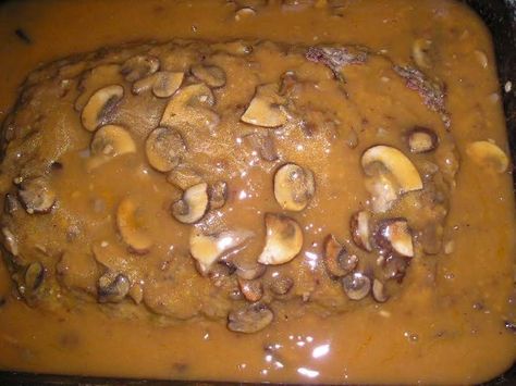 I got this recipe 20+ yrs or so ago. It was presented on one of the cooking shows on PBS (before the Food Network.) I jotted it down (no home computer then.) I tweaked it to my taste, but it pretty much is the recipe shown on TV. You must be a mushroom lover to appreciate this one. The Best Meatloaf, Cooking Shows, Good Meatloaf Recipe, Best Meatloaf, Mushroom Gravy, Meatloaf Recipe, Beef Dinner, Meatloaf Recipes, Food Shows