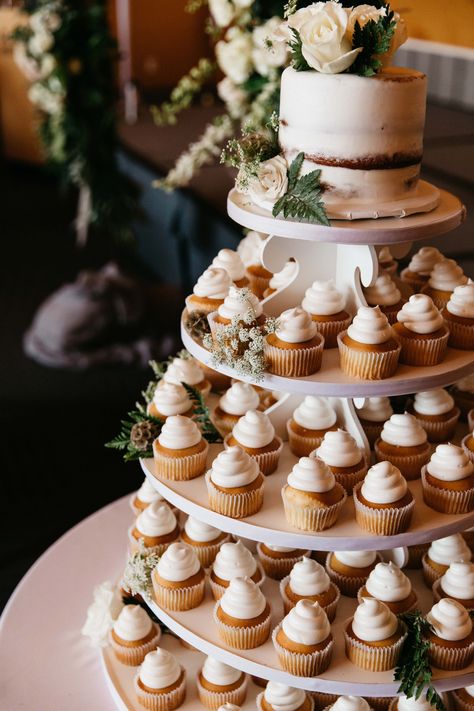 Simple Cupcakes Wedding, Cupcake Tier Wedding, Simple White Cupcakes Wedding, Wedding Small Cake And Cupcakes, Single Cake Wedding, Boho Wedding Cake With Cupcakes, Wedding Cupcakes Tower, Simple One Tier Wedding Cake Rustic, Cupcake Tower Wedding Rustic