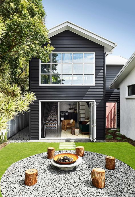 The white window trims and roof contrast beautifully against the dark exterior of this home. Dark Home Exterior, Dark House Exterior, New York Loft, Dark House, Exterior Color Schemes, Dark Home, Casa Exterior, White Windows, Barn Style House