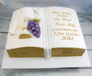 Holy communion cake in the shape of a bible, with hand made fully edible chalice,grapes, host and cloth. Edges , lettering and trim on chalice were hand painted with edible gold paint. Boys First Communion Cakes, Edible Gold Paint, Open Book Cakes, Three Tiered Cake, Boy Communion Cake, Comunion Cake, Holy Communion Cake, Bible Cake, Cake Paris