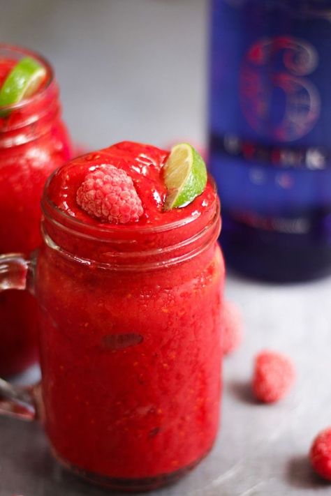 This delicious Raspberry Gin Frozen Cocktail recipe is the ultimate adult slushie! So easy to make with just a handful of ingredients. Don't miss this drink of the summer. This slushy is packed with fruit and lime juice for the ultimate homemade summer cocktail recipe. Blend it and go! #cocktails #gincocktail #tamingtwins #cocktailrecipe #raspberryrecipe #blenderrecipe Frozen Summer Cocktails, Best Gin Cocktails, Raspberry Gin, Frozen Cocktail, Frozen Cocktail Recipes, Gin Cocktail Recipes, Homemade Cocktails, Raspberry Recipes, Banana Milkshake