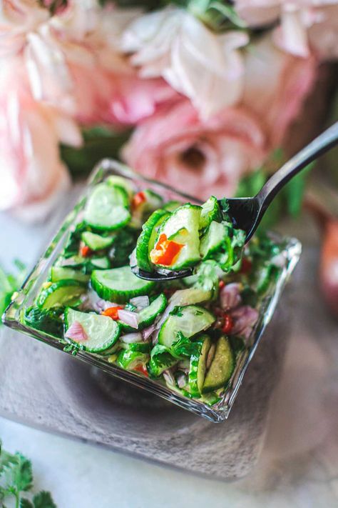 This Ajaat recipe, a Thai cucumber salad is a simple, light and refreshing side dish typically served on the side with Thai satay. The sweet, sour, and crispy relish with a tinge of spicy is a perfect summer condiment. #Thaicucumbersaladforsatay #thaicucumbersalad #thaicucumberrelish #ajaat #thaiajaadrecipe Chicken Satay Sides, Thai Cucumber Relish, Thai Marinated Cucumbers, Spicy Asian Cucumber Salad, Thai Cucumber Carrot Salad, Spicy Cucumber Salad Asian, Peanut Satay Sauce, Thai Cucumber Salad, Chicken Satay Recipe