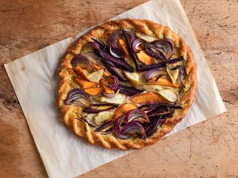 Get Roasted Carrot Tart Recipe from Food Network. Can serve with fried egg on top.  Can serve with salad for lunch.  Use puff pastry for crust instead of dough. Carrot Tart, Tart Dough, Roasted Carrot, Red Onion Salad, Rainbow Carrots, Barefoot Contessa, Tart Recipe, Pie Dough, Roasted Carrots