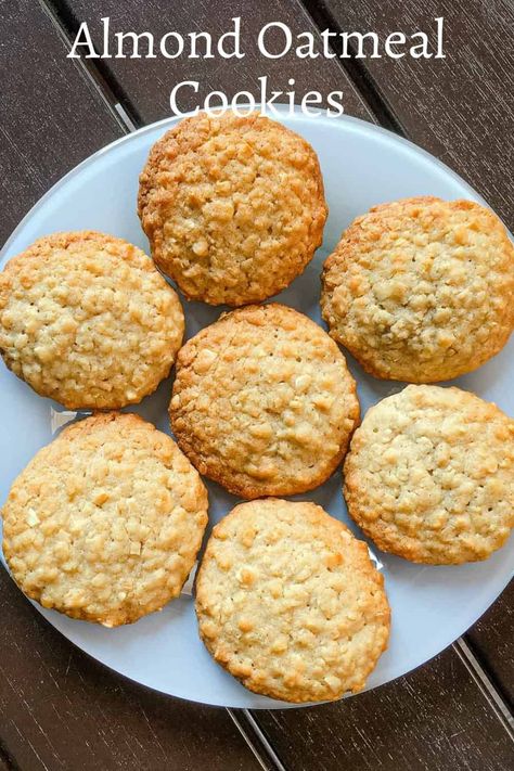 This is an absolutely easy almond oatmeal cookies recipe, one that is not only simple but yields deliciously soft and chewy oatmeal cookies. #almondoatmealcookies #almondoatmealcookiesrecipe #decoratedtreats #oatmealcookies #chewyoatmealcookies Coconut Almond Oatmeal Cookies, Oatmeal Almond Cookies, Crunchy Oatmeal Cookies, Almond Oatmeal Cookies, Soft And Chewy Oatmeal Cookies, Oatmeal Cookies Recipes Easy, Almond Oatmeal, Oat Cookie Recipe, Chewy Oatmeal Cookies