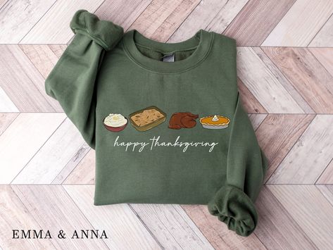 Thanksgiving Food Sweatshirt *Product Details - Printed with ink - Unisex Sweatshirt - Designed with pre-shrunk soft air-jet spun yarn - Features a crewneck - Double-needle stitched collar, shoulders, armholes, cuffs and hem - Loose fit for a comfortable feel *Sizing and Colors - Please refer to sizing and color charts in the images *Fabrication - 50% cotton, 50% polyester *Care Instructions - Turn inside out and machine wash cold on delicate cycle - Dry on low heat setting - Do not bleach - Do not dry clean - Do not iron directly on design *Processing and Shipping Times - Please allow 2-10 business days for your order to be processed and made - Standard shipping takes 3-5 days - Please note that these times are estimated by USPS and may take longer - Please make sure your shipping address Thanksgiving Sweatshirts Vinyl, Fall Embroidery Designs Sweatshirt, Thanksgiving Shirt Ideas, Thanksgiving T Shirts, Thanksgiving Crewneck, Thanksgiving Clothing, Pie Shirt, Holiday Tees, Cow Hoodie