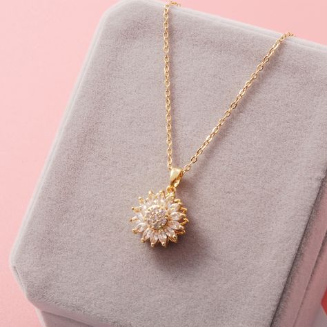 Fashion collier tendances 2022 flower pendant necklace spinning sunflower pendant necklace https://m.alibaba.com/product/1600475471258/Fashion-collier-tendances-2022-flower-pendant.html?__sceneInfo={"cacheTime":"1800000","type":"appDetailShare"} Gold Bridesmaid Bracelet, Chunky Silver Rings, Clear Quartz Necklace, Delicate Gold Necklace, Minimalist Pendant, Sparkly Ring, Sunflower Pendant, Sunflower Necklace, Simple Bracelets