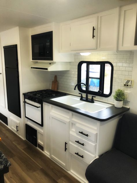 White And Black Rv Interior, Black And White Trailer Remodel, Black White Camper Interior, Black And White Caravan Interior, Black And White Camper Decor, Black And White Rv Decor, Black Caravan Interior, Black And White Camper Remodel, Black And White Camper Interior