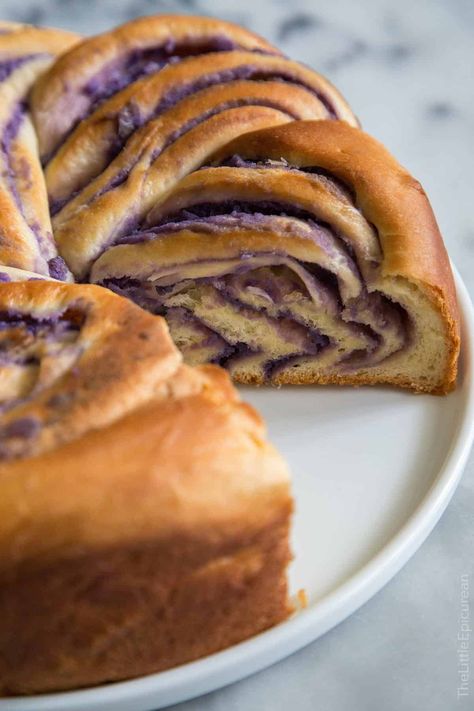 A Filipino variation on cinnamon roll. Ube swirl bread is a soft yeasted dough filled with sweet coconut and purple yam paste. #ubebread #swirlcake #swirlbread Asian Bread Recipe, Filipino Bread Recipe, Easy Filipino Recipes, Filipino Dessert Recipes, Butter Mochi, Swirl Bread, Different Types Of Bread, Swirl Cake, Purple Yam