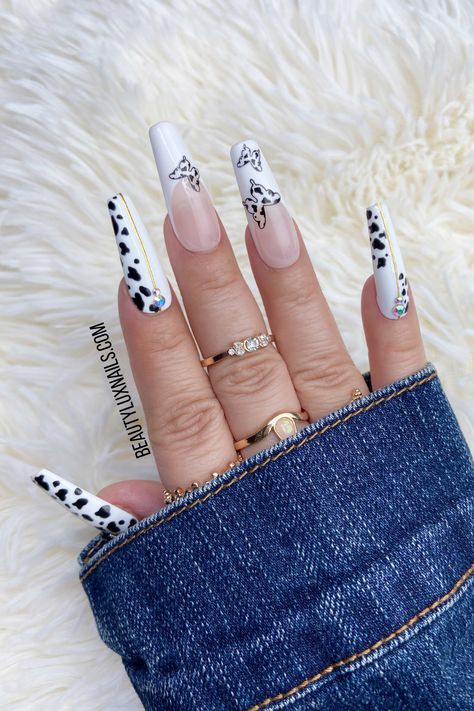 Tell me you love cow print, without telling me you love cow print -Buttermilke is our new arrival, check out link below if you are interested. #cowprint #coffinnails #whitenails #longnails #pressons #fakenails #acrylicnails #blingnails #butterflynails #summernails #trendynails #nailsofig #dopenails #wownails White Nails Cow Print, French Tips With Butterflies, Solid White Nails, Nails Cow Print, Lux Nails, Handmade Nails, Butterfly Nail Designs, Art Goals, New Years Eve Nails