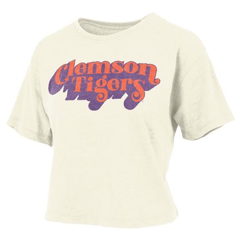 The Women's Pressbox White Clemson Tigers Vintage Easy Team Name Waist-Length T-Shirt is the perfect way to show your support for the Clemson Tigers. Made from a soft cotton and polyester blend, this t-shirt is comfortable to wear all day long. The screen print graphics and rounded hem give it a stylish look, while the waist length makes it easy to pair with your favorite jeans or shorts. Whether you're cheering on the Tigers at the game or just showing your support around town, this t-shirt is Gameday Couture, Clemson Tigers, Tiger T Shirt, Team Name, Team Names, Cut Design, Waist Length, Oversized Tshirt, Favorite Jeans