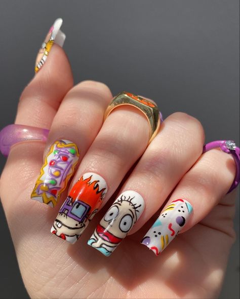 Rugrats nails and rings 90s nails 90skid Nickelodeon nails character nails Shop my website for your own crazy Custom nails! Rocket Power Nails, Nickelodeon Nails, Rugrats Nails, Garfield Nails, Crayon Nails, 90s Cartoon Nails Acrylic, Nails And Rings, Character Nails, Ballerina Nail